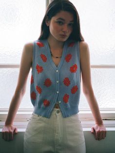 This is a trendy and feminine vest by SSEMI that is made out of high quality and sturdy material. With distinctive mood of the design and comfortable wear, you can style it for your casual daily outfit.- Button down closure on the front- Unique flower pattern- Feminine and casual mood Fitted Sweater Vest For Day Out, Colorful Sweater Vest Outfit, Casual Button-up Spring Vest, Casual Cotton Cardigan With Floral Print, Trendy Button-up Cotton Vest, Fitted Sweater Vest For Fall Day Out, Fall Sweater Vest For Day Out, Fitted Sweater Vest For Spring Day Out, Casual Sweater Vest With Buttons