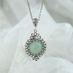 925 Sterling Silver Filigree Art Boho Aqua Chalcedony Women Pendant Necklace Pendant height: 1.50 inches and Width: 0.80 inches Chain Style: 18.00 inches +2.00 inches (extender) This metal embroidery filigree necklace is oxidized and highly polished. Aqua Chalcedony Gemstone is 12 mm double side faceted, round rose cut. This lovely necklace can add the perfect touch to an everyday to a night time wear. Filigree is a unique piece that incorporates handcrafted twisted threads of precious metal into its design. The metal is then soldered to the Silver jewelry and can take the shape of lacy flourishes, beautiful scroll work, symmetrical Art Deco style designs, among other astonishing motifs. It's good to point out that Filigree can also be used to describe any pattern in jewelry that can be se Sterling Silver Boho Necklace, Boho Pendant Necklace, Dainty Pendant Necklace, Filigree Pendant Necklace, Floral Pendant Necklace, Filigree Necklaces, Art Necklaces, Citrine Necklace, Filigree Pendant