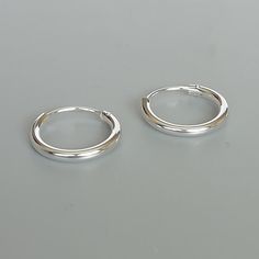 IMPORTANT **Please go through all the pictures i have posted for a listing with a ruler, on a model, on my hand, to get an exact idea of the actual size of the item.16 mm sterling silver ear hoops. Dimensions: 2 x 16 mm Price listed is for a PAIR of hoops. These earrings are made of 925 hypoallergenic sterling silver Can be packaged in a gift box. I can include a personal message from you if needed You are welcome to contact me at... bhavnakwintra1956@gmail.com For more beautiful pieces from my Simple Silver Hoop Huggie Earrings, Wanderlust Jewelry, Hoops Silver, Hoop Earrings Silver, Hoop Charms, Jewelry Minimalist, Skull Earrings, Sterling Silver Hoops, Toe Rings