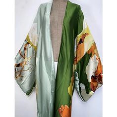 One Size fits S-3X/4X Kimono length: 58inch Material: Poly Silk (a lightweight, smooth, and shiny fabric that drapes and flows very well. An affordable alternative to silk) One Size Fits Most Size Chart Spring Satin Wrap Kimono, Elegant Green Wrap Kimono, Elegant Beach Satin Kimono, Elegant Satin Beach Kimono, Spring Green Silk Kimono, Green Silk Kimono For Spring, Green Satin Kimono, Chic Green Long Sleeve Kimono, Chic Long Sleeve Green Kimono