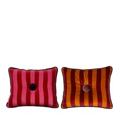 two red and orange striped pillows on a white background, one with a button in the middle