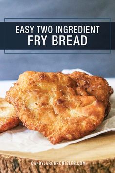 two ingredient fry bread on top of a piece of wood with text overlay that reads easy two ingredient fry bread