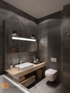 a bathroom with a sink, toilet and bathtub in the middle of it's walls