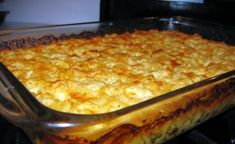 a casserole dish sitting on top of a stove