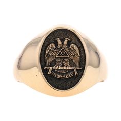 Size: 15 Sizing Fee: Up 3 sizes for $90 or Down 3 sizes for $60 Brand: Jostens Organization: Scottish Rite Metal Content: 14k Yellow Gold Style: Signet Measurements Face Height (north to south): 25/32" (19.2mm) Rise Above Finger: 5/32" (3.4mm) Weight: 17.8 Grams Stamps: 14k, Jostens, © Condition: Pre-Owned Professionally cleaned, polished, and tested to guarantee metal content. Classic 14k Gold Signet Ring For Ceremonial Occasions, Symbolic Formal Signet Ring With Polished Finish, Custom Oval Signet Ring For Formal Occasions, Classic Gold Gia Certified Signet Ring, Classic Yellow Gold Gia Certified Signet Ring, Classic Gia Certified Yellow Gold Signet Ring, Collectible Gia Certified Gold Ring, Custom Yellow Gold Ring For Formal Occasions, Custom Yellow Gold Rings For Formal Occasions