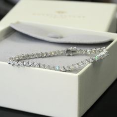 SKU : LUXB122889 This Sterling Silver Bracelet Cubic Zirconia Marquise CZ Stone Tennis Bracelet, 7.25 Inch is a meticulously crafted and beautiful bracelet. Specifications Metal color: 925 Sterling Silver Stone Color: Clear Stone Shape: Marquise Bracelet Length: 7.5 " Material: 925 Sterling Silver Our stones are the highest quality diamond simulants that are polished, finely cut, loupe clean, and have an exactly similar appearance and as beautiful as to naturally occurring diamonds. All cubic zi Elegant Diamond Cut Crystal Bracelets, Elegant Crystal Bracelet With Diamond Cut, Elegant Crystal Bracelets With Diamond Cut, Sterling Silver Bracelet With Sparkling Stones, Elegant Crystal Diamond Bracelet, Formal Diamond Bracelet With Sparkling Round Cut Stones, Elegant Diamond Bracelet With Sparkling Stones, Elegant Diamond Bracelet With Sparkling Stones For Formal Events, Luxury Wedding Tennis Bracelet With Sparkling Stones