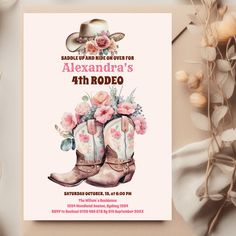 an image of a birthday card with boots and flowers on the front, in pink