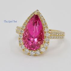 Thank you for coming in! 14k solid yellow gold ring with a stunningly beautiful 5.03CT pink tourmaline and 0.97ct natural diamond accents! You will receive the ring you see in the photos! WEIGHT: 5.36grams (5.03ct tourmaline, 0.97ct diamond) DIMENSION: 13.1mmx18.5mm top (15mmx8.68mm tourmaline) MATERIAL: 14k solid yellow gold, Pink Rubellite Tourmaline, natural diamonds Pink Pear-shaped Ring For Formal Occasions, Pear Shaped Pink Ring For Formal Occasions, Pink Pear-shaped Formal Rings, Formal Pink Pear-shaped Rings, Pink Pear-shaped Gemstone Rings, Elegant Pear-shaped Pink Ruby Ring, Elegant Pink Pear-shaped Ruby Ring, Rubellite Tourmaline, Pink Friday