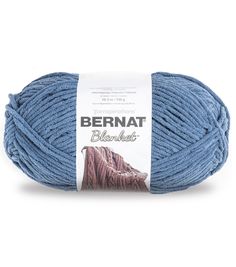 bernat blanket yarn in light blue on a white background with the label above it