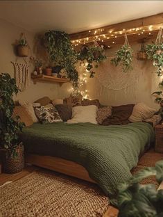 a bedroom with lots of plants and lights on the wall