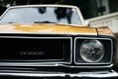 the front end of an old dodge car