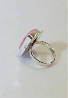 Beautiful and Rare Ring of natural Rodochrosite Gemstone in 925 sterling silver plated over solid copper. Size 8 ring. Condition: Lived a previous life & in a perfect vintage condition. Excellent condition. To see a complete listing of all the items in my shop, please click on the following link: https://www.etsy.com/shop/ReneeDawnArtfulJewel. . . . . . . . . . . . . . . . . . . . . . . . . . . . . . . . . . . . . . . . . . PACKAGING: If you purchase multiple items and need each piece in sep Sterling Silver Ring With Large Pink Stone, Adjustable Polished Turquoise Ring, Formal Adjustable Ring With Large Stone, Adjustable Sterling Silver Crystal Ring With Large Stone, Unique Pink Rings With Large Stone, Adjustable Sterling Silver Ring With Large Stone, Adjustable Cabochon Ring For Formal Occasions, Adjustable Cabochon Rings For Formal Occasions, Pink Adjustable Ring For Formal Occasions