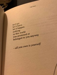 an open book with some writing on it's pages and the words let it go, let it happen not that this world was provided or belonging to you anyway