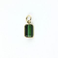 Material: 14k solid yellow gold (not gold plated or gold filled) Main Stone: Tourmaline Main Stone Color: Green Main Stone Shape: Octagon Stone Size: 7 mm x 5 mm Carat Weight: 0.87 Carats Cabochon Pendant, Gold Wire, Green Tourmaline, Pendant Set, Solid Yellow, Charm Pendant, Stone Color, Tourmaline, Solid Gold