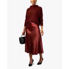 Elegance In Wine: Satin Midi Skirt Dress Up Your Wardrobe With This Luxurious Satin Midi Skirt In A Sumptuous Wine Hue. Perfect For A Transition From Office To Evening Wear, Its Fluid Drape And Gleaming Finish Promise To Make Every Outfit Shine. Pair It With A Light Blouse For Daytime Sophistication Or A Sparkling Top For A Night Out. Embrace The Versatility Of Satin This Season Chic Red Silk Bottoms, Red Silk Evening Bottoms, Red Silk Bottoms For Evening, Silk Workwear Skirt For Fall, Silk Skirt For Workwear In Fall, Fall Silk Skirt For Work, Elegant Red Evening Skirt, Formal Silk Skirt For Fall, Red Silk Skirt For Evening