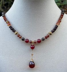 Gemstones in rich, warm tones, aaa luxe gems and 14k gold filled clasp and components, 19 inches in length. The centerpiece is a large perfectly faceted, flawless whiskey quartz gemstone briolette. Gemstones include: Quartz Garnet Hessonite garnet Jade Autumn Necklace, Beads Jewellery, Hessonite Garnet, Necklace Gemstone, Fancy Jewelry, Autumn Colors, Pretty Jewellery, Gemstone Necklace, Stone Beads