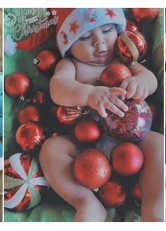 a baby is laying down surrounded by christmas ornaments