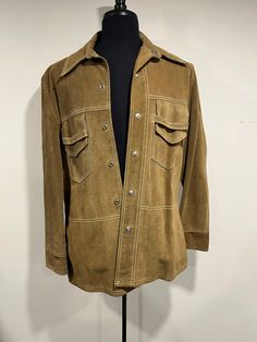 "Hello all - Selling this vintage suede jacket made by Desert Classic size 42.  Dimensions are as follows: Collar to bottom is 27\"  Collar to shoulder is 6\" Shoulder to end of sleeve 24\" Armpit to end of sleeve 16\" The jacket is in excellent condition with only some lose threading on the inside near the armpit." Suede Leather Jacket With Button-up And Pockets, Classic Button-up Suede Outerwear, Button-up Suede Outerwear With Pockets, Classic Suede Button-up Outerwear, Suede Button-up Outerwear With Buttons, Suede Button-up Outerwear, Retro Single Breasted Leather Jacket With Long Sleeves, Winter Suede Button-up Outerwear, Retro Single-breasted Leather Jacket With Long Sleeves