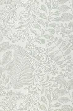 a white and green wallpaper with leaves on it