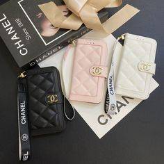 Buy CHANEL new free shipping. Luxury gift accessories discount. Luxurious Genuine Leather Construction: The Chanel crossbody bag iPhone case is crafted from high-quality genuine leather, providing a rich texture and exceptional durability. The premium leather ensures a luxurious feel and sophisticated look. Integrated Wallet Functionality: This case features a built-in wallet with multiple card slots and a secure compartment for cash or small essentials. The wallet functionality adds ... Chanel Branding, Chanel Crossbody Bag, Chanel Iphone Case, Chanel Crossbody, Luxury Phone Case, Black Iphone Cases, Leather Card Wallet, Chanel Logo, Apple Iphone Case