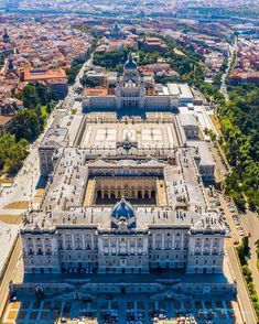 an aerial view of the stately building in madrid