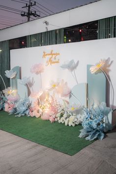 a display with flowers and lights on it