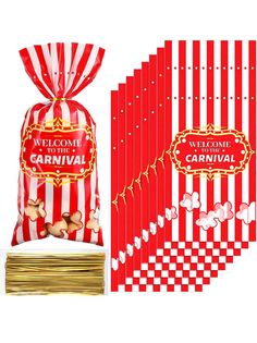 red and white striped bags with welcome to the carnival stickers next to each bag