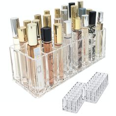 PRICES MAY VARY. DESIGNED To Fit Tall Rollerball Perfumes To Help From Falling Over MADE From A Single Piece With The Highest Quality Crystalline Acrylic for a Flawless Clear Look & No Glued Pieces SIZE 9.17L x 3.5W x 3H inches with .85 inch inner cubes ORGANIZE 24 Individual Rollerball Perfume Bottles THICK Acrylic With Rounded Edges Offers a Beautiful Look and Feel PACKAGED In Soft Protective Foam Within a Black and Metallic Silver Box Inspired By Professional Makeup Artists, You Will Notice T Perfume Collection Display, Perfume Organizer, Perfume Storage, Space Organization, Perfume Display, Perfume Organization, Travel Perfume, Container Storage, Travel Size Perfume