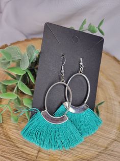 Handcrafted exclusively for your person favorite person in mind. These earrings are made with a silver metal oval with Turquoise fringe. All of earring hooks and jump rings are made of metal alloy, high quality nickel free & lead free, earring backs are made of clear silicone. They are safe and no reactions to very sensitive skin Silver Fringe Metal Earrings, Silver Dangle Tassel Earrings, Silver Tassel Earrings With Fringe As Gift, Silver Fringe Drop Earrings, Metal Tassel Dangle Earrings With Fringe, Metal Tassel Fringe Drop Earrings, Silver Nickel-free Dangle Tassel Earrings, Silver Dangle Tassel Earrings With Fringe, Silver Nickel-free Drop Tassel Earrings