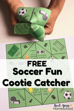 a person holding up a paper soccer game with the text free soccer fun cootie catcher