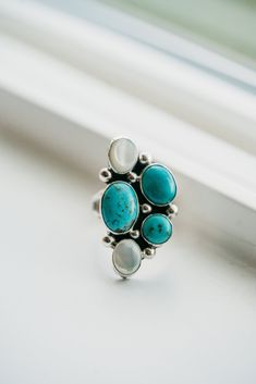 The Ellen ring, officially my new favorite ring on our website! Uniquely shaped and even prettier in person! Turquoise stones Mother of Pearl Shell stones Silver dot detailing Dark oxidation to make the stone colors pop Flattering and feminine shape Sterling silver Ring Turquoise, Turquoise Stones, Pearl Shell, Favorite Rings, Small Hands, Turquoise Stone, Turquoise Ring, Mother Of Pearl, Stone Color