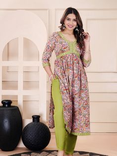 This beautiful Rayon Alia cut Kurta suit set is the most comfortable and classy Indian outfit. Soothing Rayon fabric with sequence detailing makes it very elegant. The pants a comfort fit with elastic band that makes the pants roomy. 3/4th sleeves and straight fit kurta make it comfortable to wear for long hours , can be accessorized and worn at occasions . Soft Rayon Kurta Pant Set is so comfortable and stylish Specially handmade with love for you by the local Artisans of Jaipur , Rajasthan , India ! Size chart in pictures Model is wearing size M size chart in pics set includes 1 kurta with pants and Dupatta . Semi-stitched Pant Set With Dupatta For Diwali, Anarkali Palazzo Set In Pista Green Cotton, Diwali Semi-stitched Pant Set With Dupatta, Semi-stitched Cotton Palazzo Set With Traditional Drape, Multicolor Cotton Silk Lawn Suit With Straight Kurta, Semi-stitched Cotton Lawn Suit For Transitional Season, Anarkali Semi-stitched Pant Set With Traditional Drape, Semi-stitched Cotton Palazzo Set For Navratri, Anarkali Cotton Lawn Suit With Cutdana