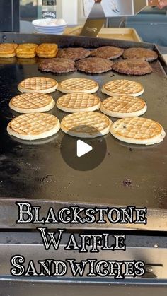 the waffles are being cooked on the grill in the kitchen for customers to eat