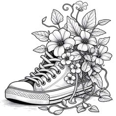 a pair of sneakers with flowers on the soles and leaves around them, all in black and white