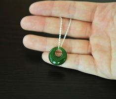 Very rare find natural grade A nephrite green jade circle pendent. Perfect gift for: birthday gift, mother's day gift, girl friend's special gift, besty NFF's gift. Natural jade is unique for every single piece, pick the special gift just for her/him <3 Condition: Brand new Length: 16", 18", 20" Necklace made: 14K Gold filled, 925 silver Type of jade: Nephrite Color of jade: Emerald green Jade diameter: 16MM. 0.63" Green Circular Jewelry Gift, Green Round Minimalist Jewelry, Green Minimalist Round Jewelry, Green Circle Jade Necklace, Circular Green Jade Necklace, Green Jade Circle Necklace, Jade Pendant Necklace, Classical Design, Nephrite Jade