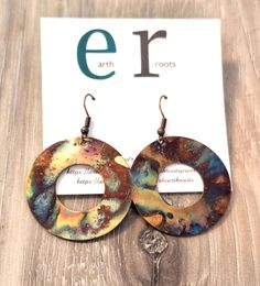 These boho style earrings feature copper hoops that have been fire painted using a propane torch to bring out the different colors in the metal.   NOTE:  Certain lighting will bring the colors out more than other types of lighting. The hoops measure 1.5" in diameter.  They will ship in a gift box via USPS with tracking info provided. Adjustable Nickel-free Rust-colored Jewelry, Artsy Nickel-free Copper Earrings, Adjustable Rust-colored Nickel-free Jewelry, Artsy Dangle Jewelry For Festivals, Artisan Rust-colored Nickel-free Jewelry, Earthy Copper Jewelry For Festivals, Unique Rust-colored Earrings With Ear Wire, Nickel-free Rust-colored Metal Jewelry, Adjustable Circular Copper Jewelry