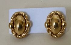 "Monet gold plated oval stud earrings  Very good to excellent condition  size - 5/8\" x 1/2\"  Marked: copyright symbol Monet  11/09/22 00949" Gold Oval Earrings Stamped 14k, Classic Yellow Gold Oval Clip-on Earrings, Classic Oval Link Earrings For Formal Occasions, Gold-tone Round Clip-on Earrings For Formal Occasions, Gold-tone Round Clip-on Earrings For Formal Events, Gold-tone Clip-on Earrings For Formal Occasions, Yellow Gold Oval Metal Earrings, Classic Oval Clip-on Earrings For Anniversary, Classic Oval Clip-on Earrings For Formal Occasions