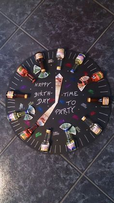 a clock that has been decorated with photos and words on the face, which reads happy birth day to mort