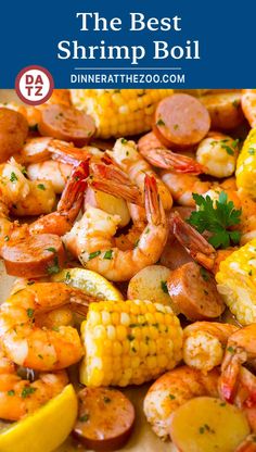 the best shrimp boil with corn on the cob and garnished with parsley