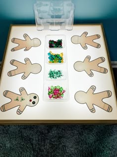 a table topped with lots of different types of beads