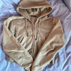 Brandy Melville Cropped Hoodie In Light Green Color. Brandy New. Never Worn. No Tags. Khaki Hooded Tops For Winter, Winter Khaki Hooded Tops, Khaki Hooded Winter Tops, Winter Hooded Khaki Tops, Trendy Khaki Hoodie For Winter, Trendy Khaki Hooded Hoodie, Trendy Hooded Khaki Hoodie, Brandy Zip Up Hoodie, Brandy Melville Green Hoodie