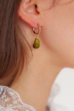 Introducing our Pear earrings! Featuring our brand new Pear charm! <3  Every picnic blanket piece is lovingly designed and handcrafted completely in-house and perfectly finished in our jewellery studio.  Every individual glass feature charm takes around half an hour to delicately form by hand in the flame, reaching temperatures of up to 800 degrees celsius, before heading to the kiln to soak for around 8 hours in the warmth to ensure strength and longevity. The charms are then washed by hand to Green Nickel-free Huggie Earrings, Green Hoop Earrings As A Gift, Handmade 14k Gold Filled Dangle Huggie Earrings, Handmade 14k Gold Filled Drop Huggie Earrings, Handmade Dangle Huggie Earrings For Gifts, Handmade Teardrop Huggie Earrings For Gift, Dainty Green Huggie Earrings As Gift, Handmade 14k Gold Filled Huggie Earrings For Gifts, Everyday Handmade 14k Gold Filled Huggie Earrings