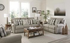 a living room filled with furniture and a clock on the wall