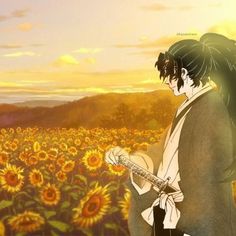 a man standing in front of a field of sunflowers holding a flute and looking at the sky