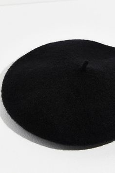 Classic and contemporary, this wool beret is featured in a soft style and structured silhouette with a round, flat top and a stalk in the center. * 22.45" * Slip-on style | Du Jour Beret by Free People in Black Chic Black Beret For Winter, Chic Black Winter Beret, Black Wool Beret For Fall, Black Fitted Beret For Fall, Fitted Black Beret For Fall, Black Brimmed Beret For Fall, Black Beret Hat, Flat Top Hats, Free People Hat