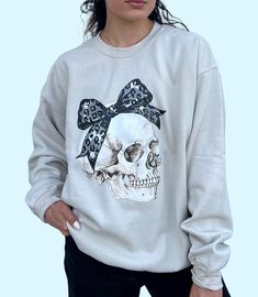 This Cute and Comfy Halloween Sweatshirt its the perfect addition to your fall weather or Halloween event. It's fall yall, look cute in our black ribbon or bow and get to look coquette and chick this holiday season.  * S I Z I N G * ♥️ Sizing is unisex so runs like men's, though not overly large ♥️Most women find their typical size works best. ♥️ Please see size guide in last listing photo for all measurements and information ♥️ 100% Soft cotton ♥️Design is high quality digital print ♥️ Wash and Skull Sweatshirt, Gothic Clothes, Fall Weather, Halloween Event, Black Ribbon, Halloween Sweatshirt, It's Fall, Pumpkin Patch, Cute Halloween