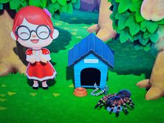 a little red haired girl standing next to a blue dog house with a spider on the ground