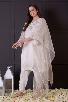 White kurta featuring zari and thread embroidery with a notched neckline. Paired with a modal satin dhoti pant and an organza dupatta., Fit: Relaxed Kurta And Dupatta, Dhoti Pants, White Kurta, Notched Neckline, Organza Dupatta, Women Kurta, Straight Kurta, Thread Embroidery, Pant Set