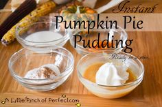 pumpkin pie pudding ingredients in small bowls on a wooden cutting board with text overlay that reads instant pumpkin pie pudding