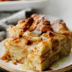 a close up of a plate of food with some kind of desert on it,